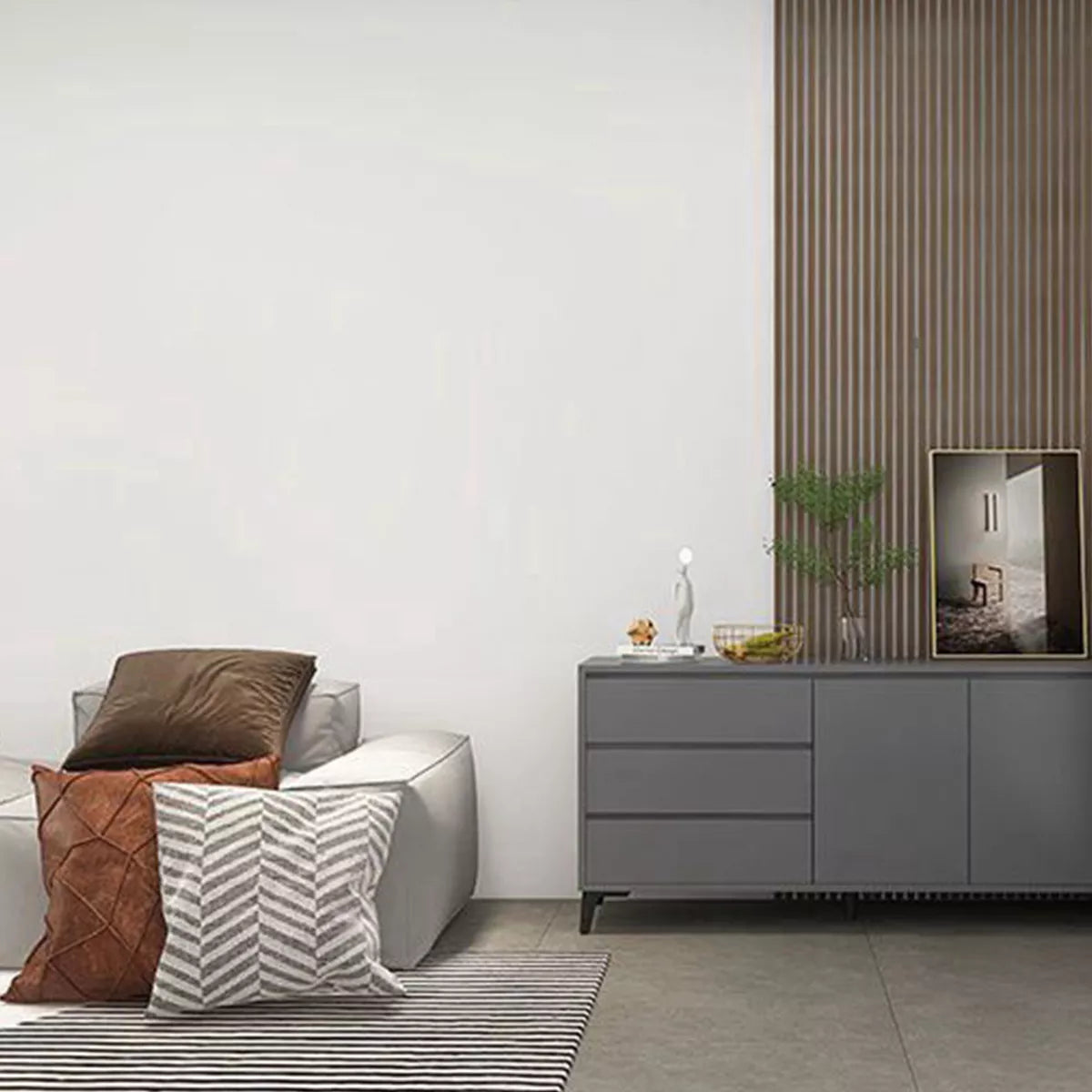 Cómoda de lujo moderna gris con diseño minimalista en sala con sofá y cojines decorativos